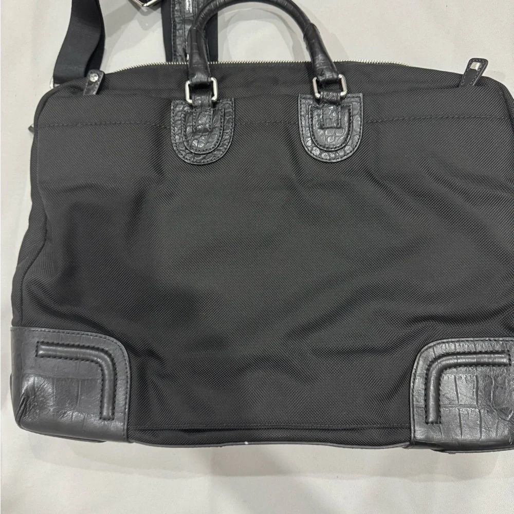 Tumi Travel Black Briefcase with Leather Finish and Metal Accents